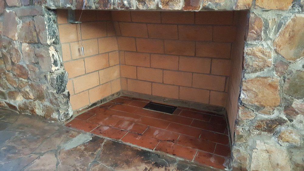 Finished firebox with new stone, brick floor, and tile hearth